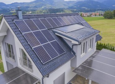 aerial-view-private-house-with-solar-panels-roof_181624-14677